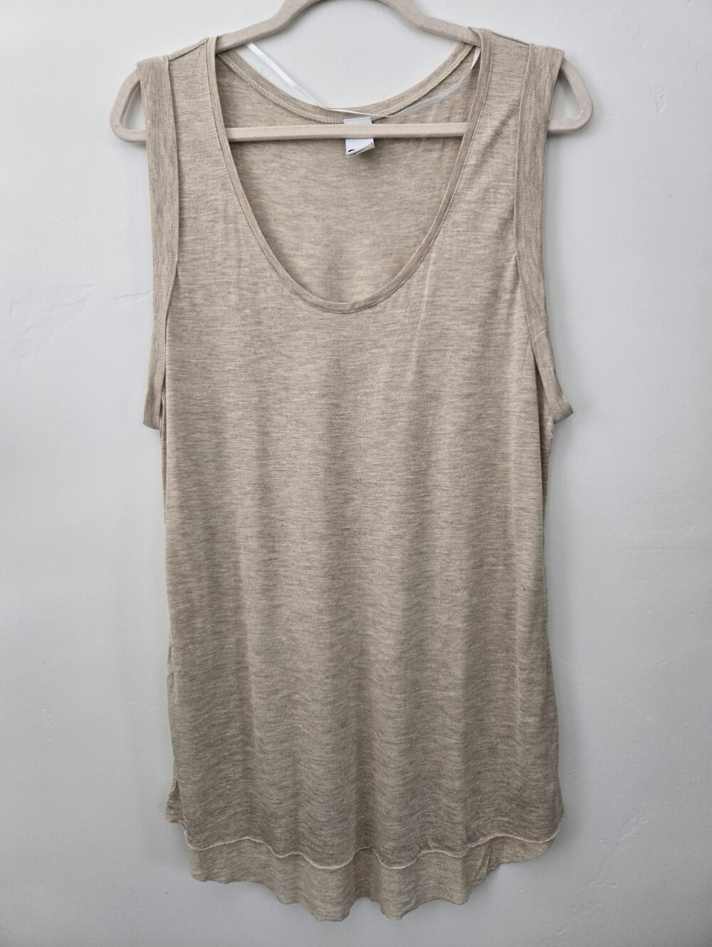 Swell basic lifestyle tank top. Relaxed fit, raw edge detailing. Oatmeal Color.